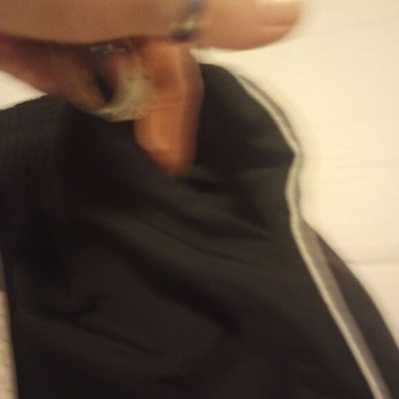 Elastic waist track style pants with pink bows accents on the sides - Picture 3 of 7